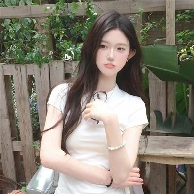 桃花含露又春风
